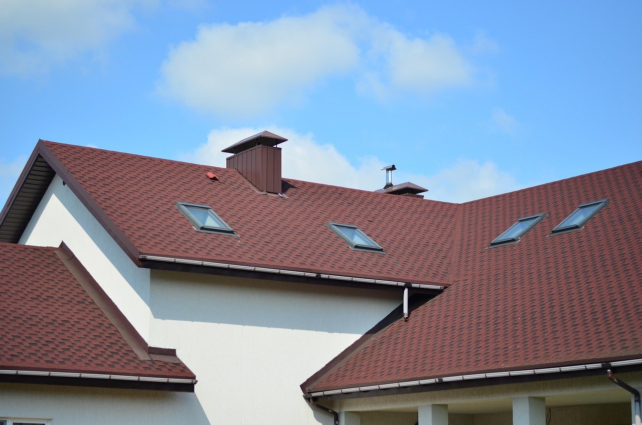 Roofers installing shingles in Murfreesboro TN residential neighborhood