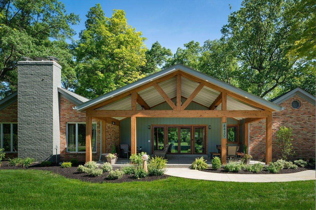 Custom porch addition in Hendersonville, TN, showcasing a beautiful front porch with wooden railings.