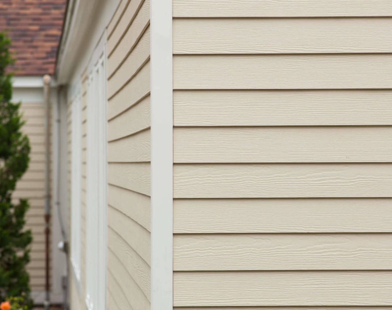 Professional siding installation in Hendersonville, TN, featuring new vinyl siding on a residential home.