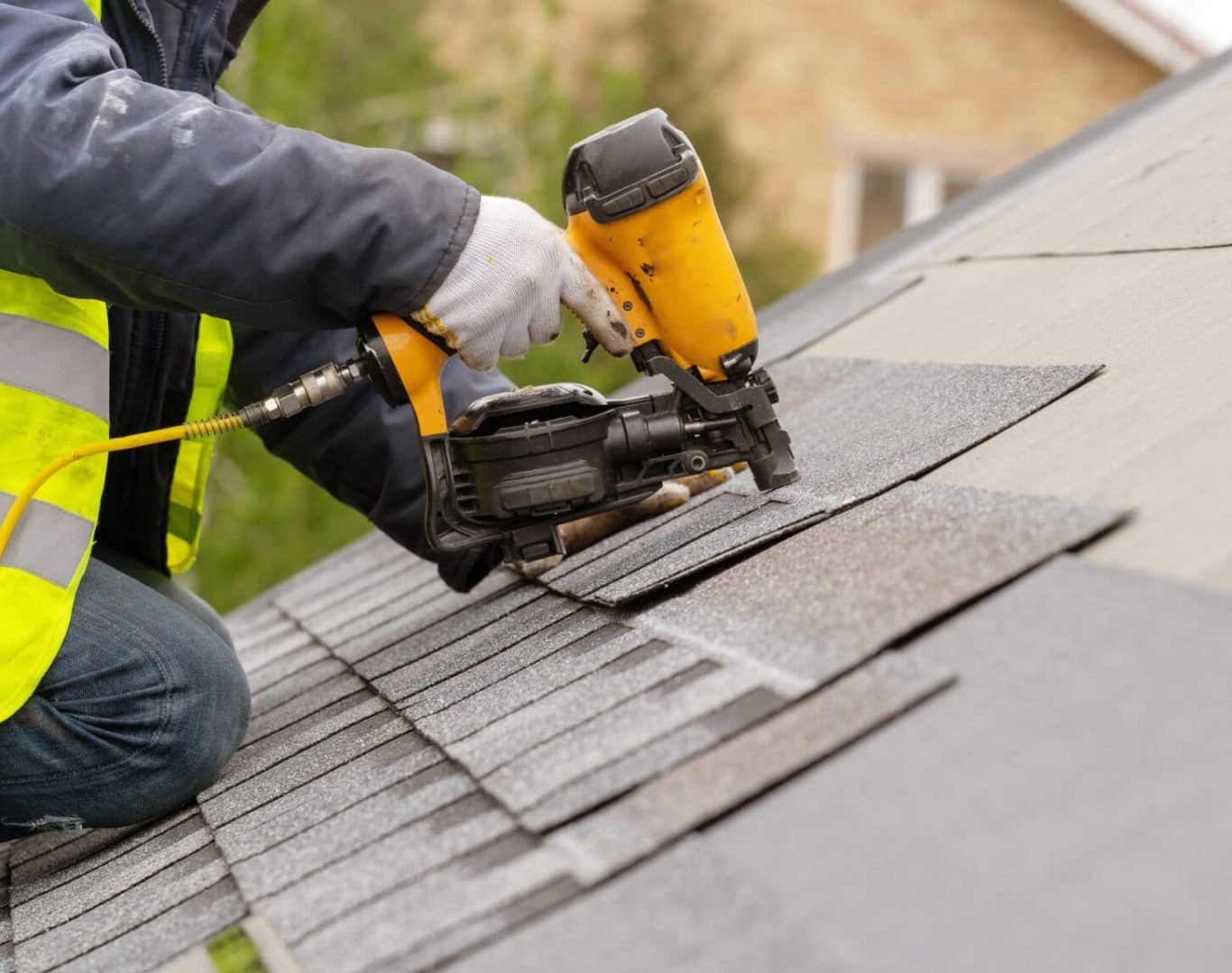 Roof replacement service with tools and safety gear near me