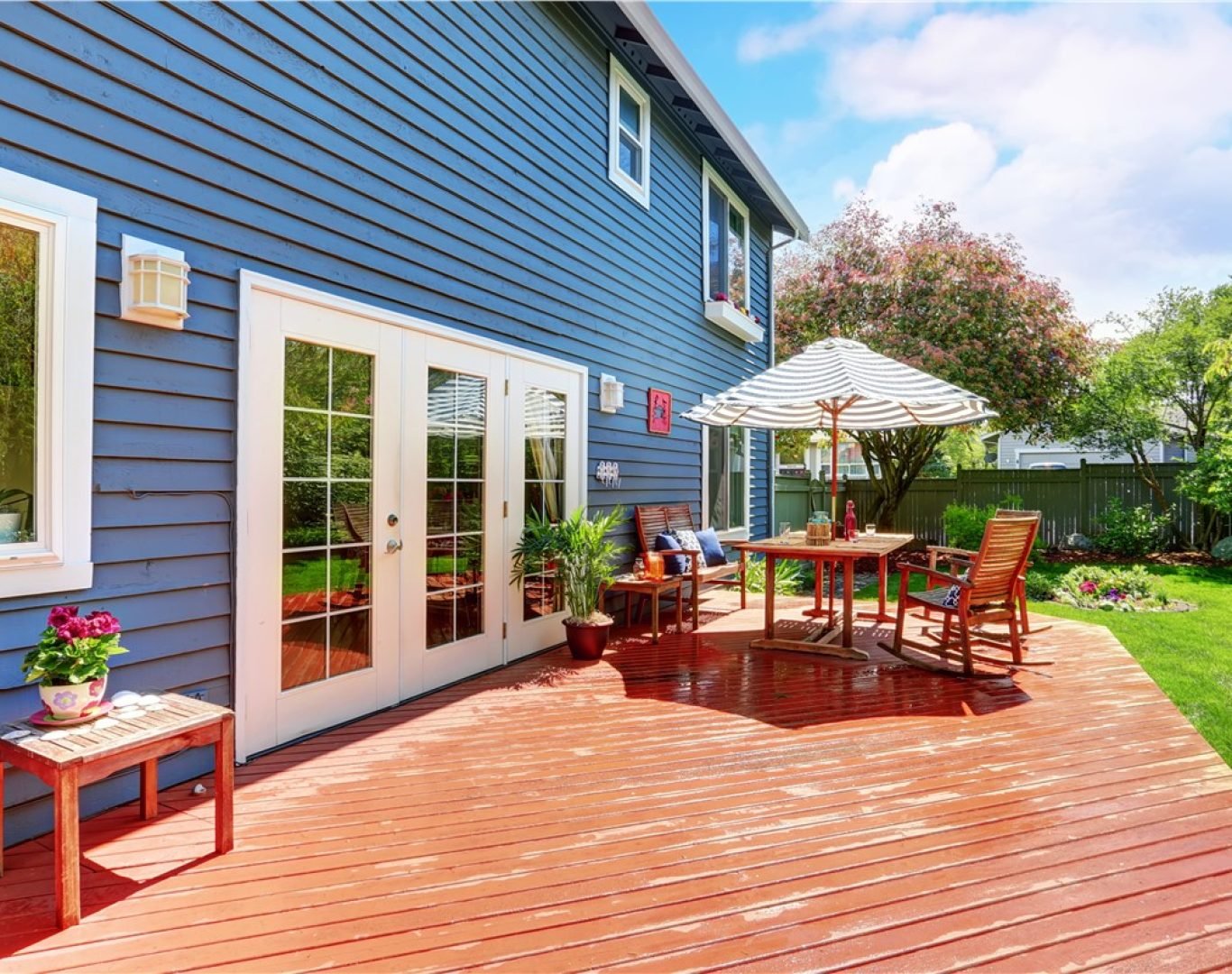 AG Exterior Solutions team repairing and restoring a wooden deck in Hendersonville, TN.