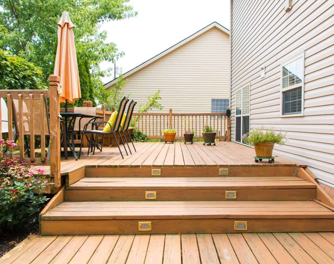 AG Exterior Solutions team repairing and restoring a wooden deck in Hendersonville, TN.